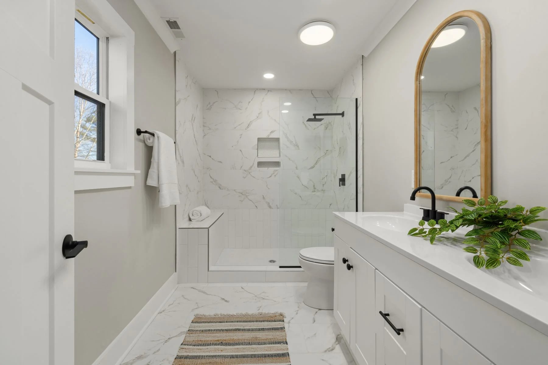 Independent bathroom inspiration with a light veined shower finish